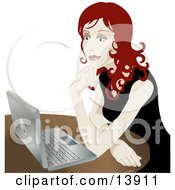 Royalty-free Clip Art: Pretty Redhead Businesswoman Sitting In Front Of A Laptop Computer
