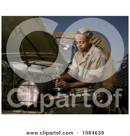 African American Mechanic Working on a Motor - Free Stock Photography by JVPD
