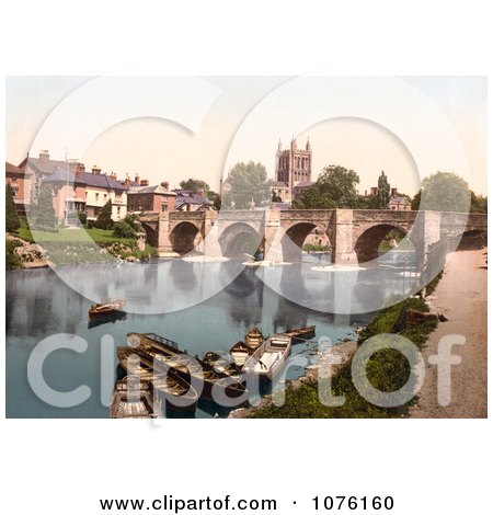 Boats Near the Medieval Bridge on the River Wye, Waterfront Buildings and the Hereford Cathedral in Hereford West Midlands England UK - Royalty Free Stock Photography  by JVPD