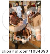 Doctor Assisting A Child Free Stock Photography