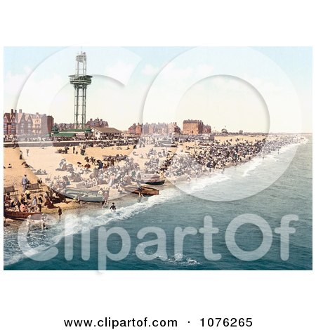 Historical People, Benches and Boats on the Beach by the Revolving Observation Tower in Yarmouth Norfolk England UK - Royalty Free Stock Photography  by JVPD