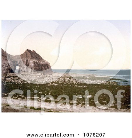 Historical the Cave on the Beach of Thornwick Bay on the North Sea in Flamborough England - Royalty Free Stock Photography  by JVPD