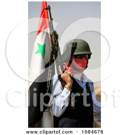 Iraqi Policeman With Concealed Face - Free Stock Photography by JVPD