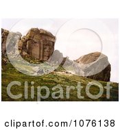 Man Looking Down From The Cliff Over Two People At Cow And Calf Rocks In Ilkley West Yorkshire England UK Royalty Free Stock Photography