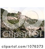 Man On A Beach Rock Looking At The Rufus Castle Ruins Church Ope Cove Isle Of Portland Dorset England Royalty Free Stock Photography