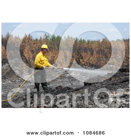 Man Putting Out a Fire - Free Stock Photography by JVPD