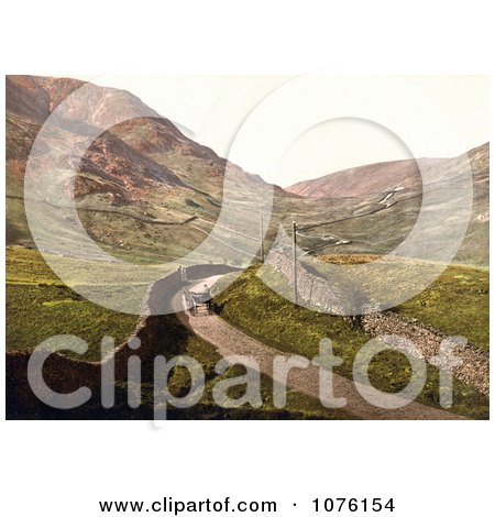 Man Travelling in a Single Horse Drawn Carriage Along a Road Lined With Stone Walls at Kirkstone Pass Lake District Ambleside Cumbria England UK - Royalty Free Stock Photography  by JVPD
