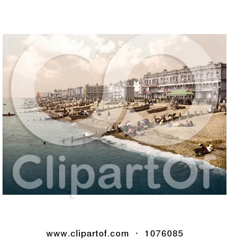 People and Boats on the Shore in Worthing West Sussex England UK - Royalty Free Stock Photography  by JVPD