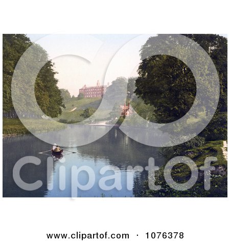 People Boating in the River Severn by the Shrewsbury School in Shrewsbury, Shropshire, England, United Kingdom - Royalty Free Stock Photography  by JVPD