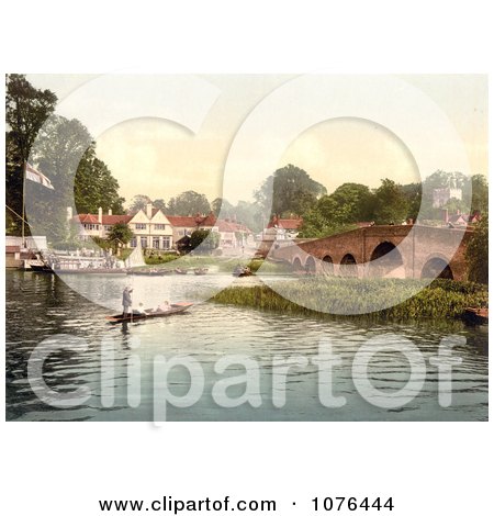 People Enjoying Gondola Rides Near the Bridge at White Heart Hotel in Sonning, England - Royalty Free Stock Photography  by JVPD