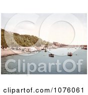 People Near Bathing Machine Carts And Boats On The Beach By The Pier In Southend On Sea Essex England UK Royalty Free Stock Photography