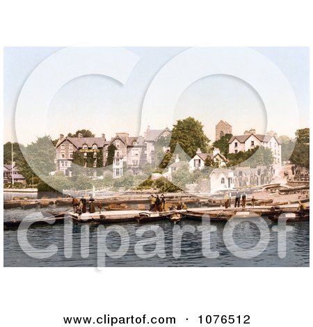People on Boats Near the Old England Hotel in Windermere, Cumbria, Lake District, England - Royalty Free Stock Photography  by JVPD