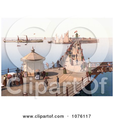 People Strolling past the Reads Grand Camera Obscura Building on the Margate Jetty in Margate Thanet Kent England UK - Royalty Free Stock Photography  by JVPD
