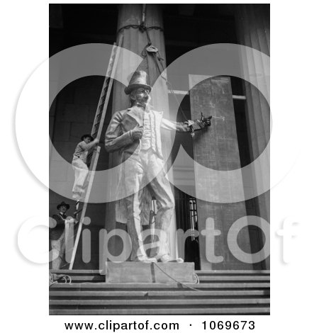 Photo Of Two Men On A Ladder, Aligning The Giant Statue Of Uncle Sam At The Subtreasury - Royalty Free Historical Black And White Stock Photography by JVPD
