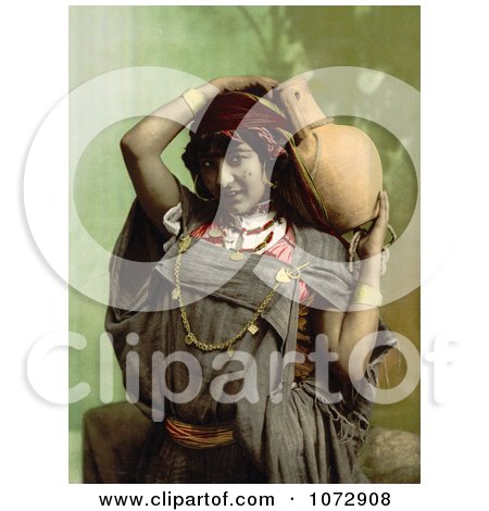 Photochrom of a Bedouin Woman Carrying a Pottery Vessel - Royalty Free Historical Stock Photography by JVPD