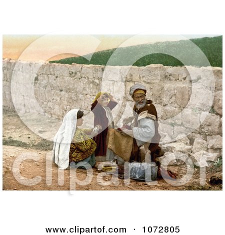 Photochrom of a Shoemaker Man and Children by a Wall in Jerusalem - Royalty Free Historical Stock Photography by JVPD