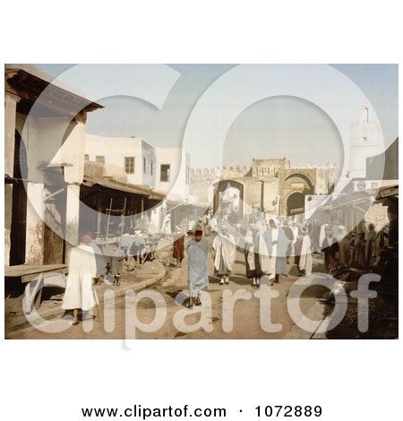 Photochrom of a Street Scene With People in Kairwan, Tunisia - Royalty Free Historical Stock Photography by JVPD