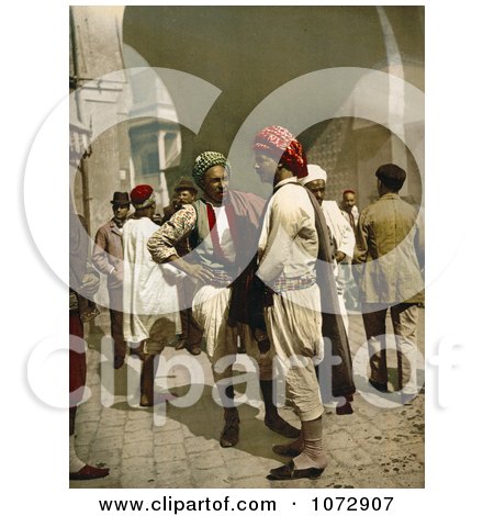 Photochrom of Arabian Men Chatting in the Street in Tunis, Tunisia - Royalty Free Historical Stock Photography by JVPD