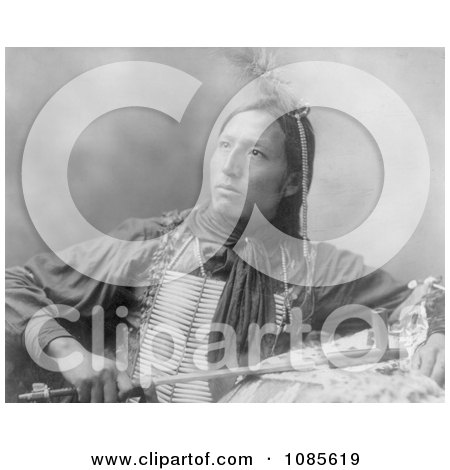 Sioux Indian Holding a Peace Pipe - Free Historical Stock Photography by JVPD