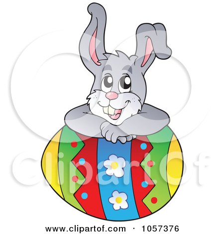 Royalty-Free Vector Clip Art Illustration of an Easter Bunny Resting On An Egg by visekart