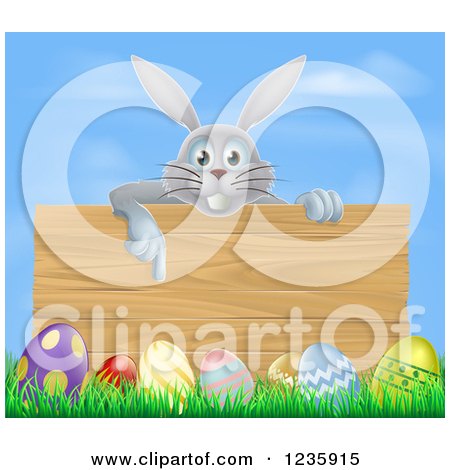 Clipart of a Gray Bunny Pointing down to a Wood Sign with Grass and Easter Eggs - Royalty Free Vector Illustration by AtStockIllustration