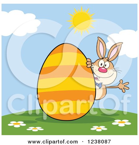 Clipart of a Brown Rabbit Waving on a Hill, with a Giant Orange Striped Easter Egg - Royalty Free Vector Illustration by Hit Toon