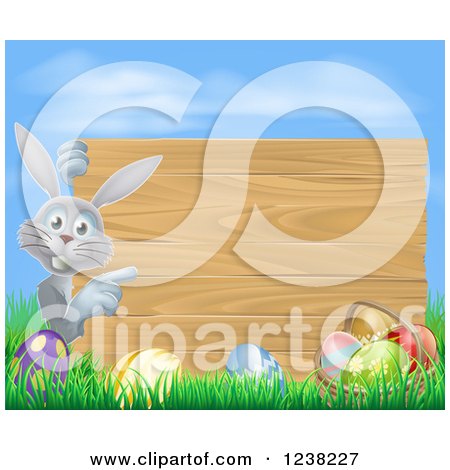 Clipart of a Wood Sign, Gray Easter Bunny with Eggs Grass and Sky - Royalty Free Vector Illustration by AtStockIllustration