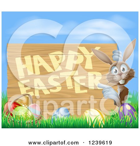 Clipart of a Brown Bunny Pointing to a Happy Easter Sign, with Easter Eggs in Grass - Royalty Free Vector Illustration by AtStockIllustration