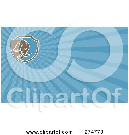 Clipart of a Retro Brown Woodcut Elephant and Blue Rays Business Card Design - Royalty Free Illustration by patrimonio