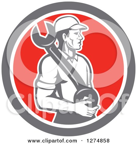 Clipart of a Retro Mechanic Man Holding a Giant Spanner Wrench in a Taupe White and Red Circle - Royalty Free Vector Illustration by patrimonio