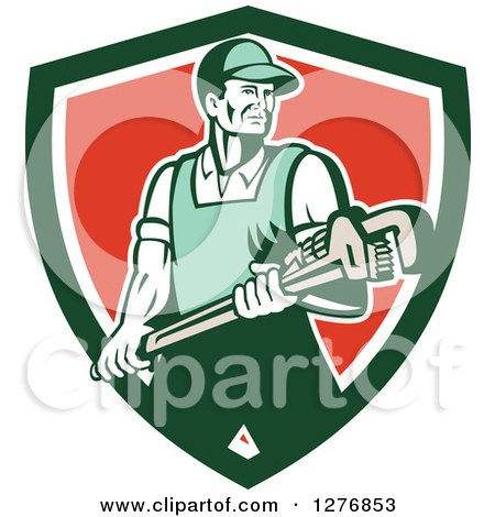 Clipart of a Retro Male Plumber Holding a Large Monkey Wrench in a Green White and Red Shield - Royalty Free Vector Illustration by patrimonio
