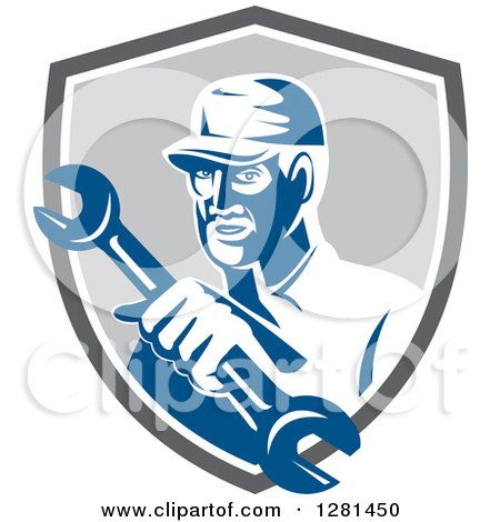 Clipart of a Retro Male Mechanic Holding out a Wrench in a Gray Blue and White Shield - Royalty Free Vector Illustration by patrimonio