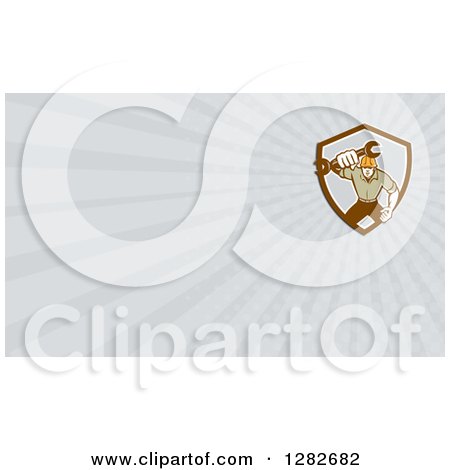 Clipart of a Retro Mechanic Holding out a Wrench and Gray Rays Background or Business Card Design - Royalty Free Illustration by patrimonio