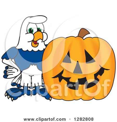Clipart of a Happy Seahawk School Mascot Character by a Halloween Jackolantern Pumpkin - Royalty Free Vector Illustration by Mascot Junction