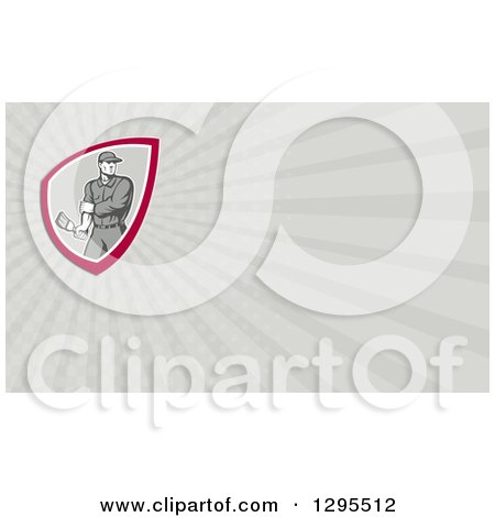 Clipart of a Retro Male House Painter Holding a Brush and Rolling up a Sleeve and Gray Rays Background or Business Card Design - Royalty Free Illustration by patrimonio