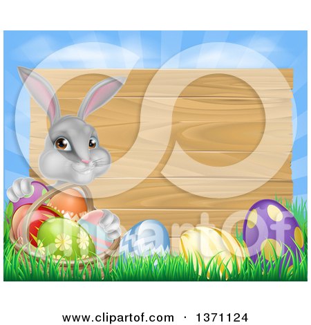 Clipart of a Gray Easter Bunny Rabbit with Eggs and a Basket, in Front of Blank Wood Sign Against Sky - Royalty Free Vector Illustration by AtStockIllustration