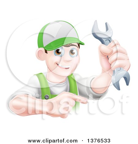 Clipart of a Happy Young Brunette Caucasian Mechanic Man in Green, Wearing a Baseball Cap, Holding a Wrench and Pointing - Royalty Free Vector Illustration by AtStockIllustration