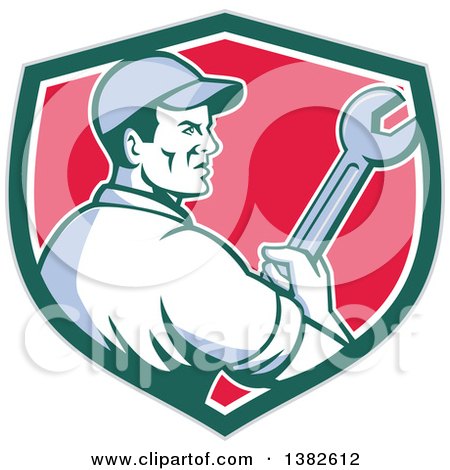 Clipart of a Retro Male Mechanic Holding a Giant Wrench in a Gray Green White and Red Shield - Royalty Free Vector Illustration by patrimonio