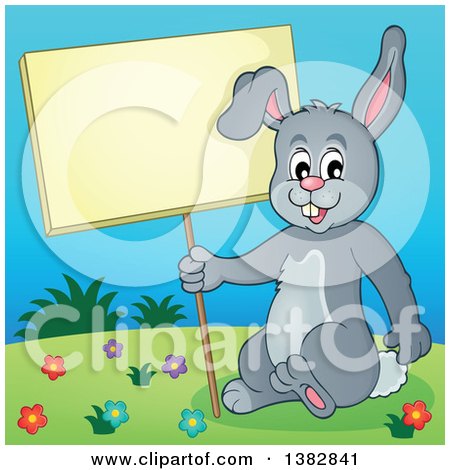 Clipart of a Happy Gray Bunny Rabbit Holding a Blank Sign on a Hill - Royalty Free Vector Illustration by visekart