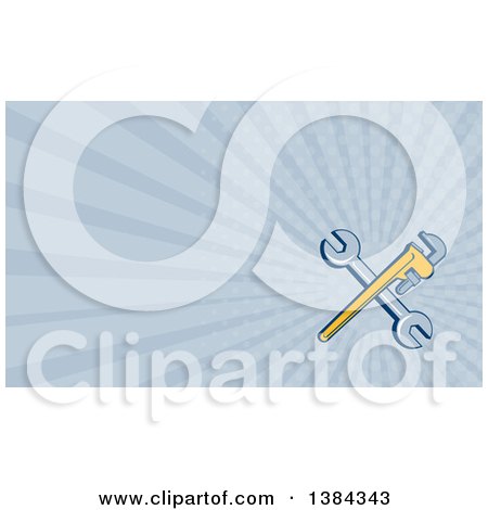Clipart of a Retro Crossed Spanner and Monkey Wrenches and Blue Rays Background or Business Card Design - Royalty Free Illustration by patrimonio