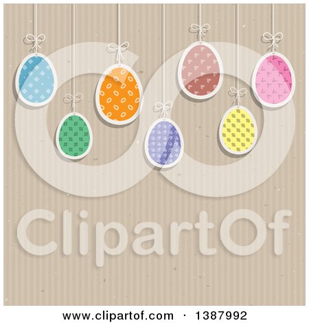 Clipart of Suspended Patterned Easter Eggs over a Cardboard Texture, with Text Space - Royalty Free Vector Illustration by KJ Pargeter