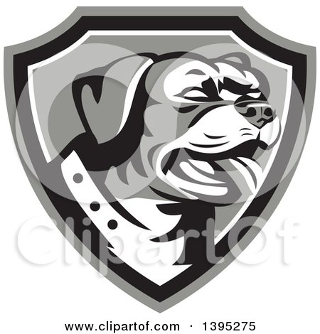 Clipart of a Retro Panting Rottweiler Head in a Shield - Royalty Free Vector Illustration by patrimonio