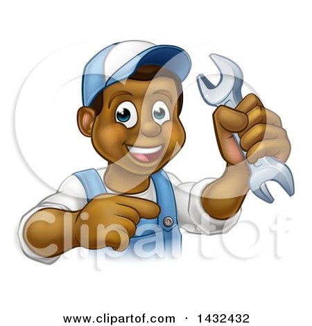 Clipart of a Cartoon Happy Black Male Mechanic Holding up a Wrench and Pointing - Royalty Free Vector Illustration by AtStockIllustration