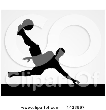Clipart of a Black Silhouetted Male Soccer Player Kicking over Gray - Royalty Free Vector Illustration by AtStockIllustration