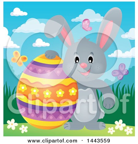 Clipart of a Gray Easter Bunny Rabbit with a Decorated Egg - Royalty Free Vector Illustration by visekart