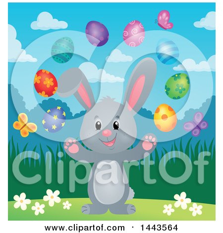 Clipart of a Gray Easter Bunny Rabbit Juggling Decorated Eggs - Royalty Free Vector Illustration by visekart