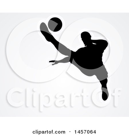 Clipart of a Black Silhouetted Male Soccer Player Kicking over Light Gray - Royalty Free Vector Illustration by AtStockIllustration
