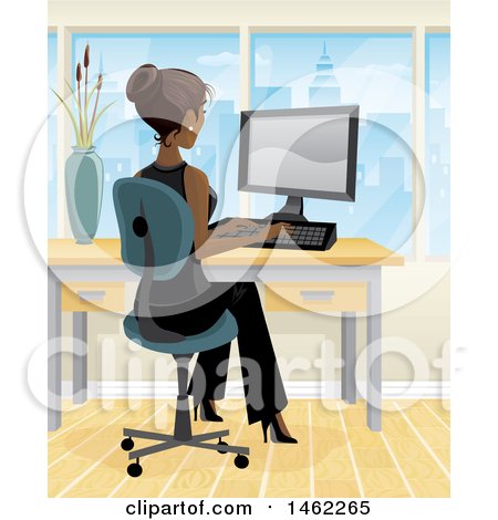 African American Business Woman Working on a Computer in Her City Office Posters, Art Prints