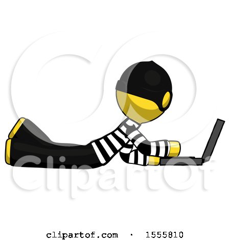 Yellow Thief Man Using Laptop Computer While Lying on Floor Side View by Leo Blanchette