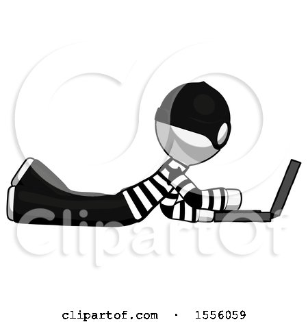 White Thief Man Using Laptop Computer While Lying on Floor Side View by Leo Blanchette